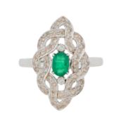 An emerald and diamond ring 14 carat white gold