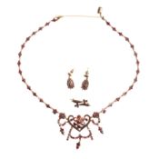 A garnet necklace, earrings, and brooch suite Yellow metal