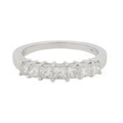 A seven-stone diamond ring 18kt white gold