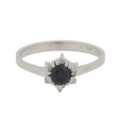 A sapphire and white sapphire ring  White metal