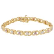 A ruby and diamond bracelet Yellow and white metal