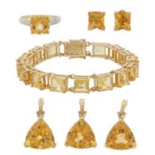 A citrine ring, bracelet, studs and pendants set 9 carat gold