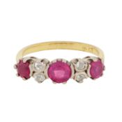A ruby and diamond ring Yellow and white metal