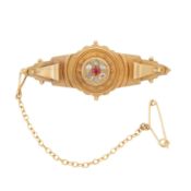 An Edwardian ruby and diamond brooch Yellow metal