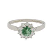 An emerald and white sapphire ring White metal 
