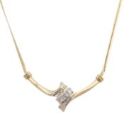 A diamond necklace Yellow metal