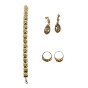A peridot bracelet, pendent earrings and rings set Yellow metal