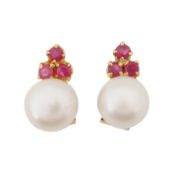 A pair of pearl and ruby stud earrings Yellow metal