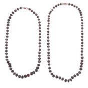 Two garnet bead necklaces White metal