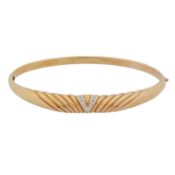 A diamond bangle Yellow metal 
