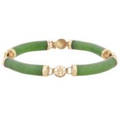 A jade bracelet Yellow metal