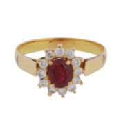 A ruby and diamond cluster ring Yellow metal