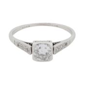A diamond ring White metal