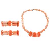 A carved coral matching set Yellow metal