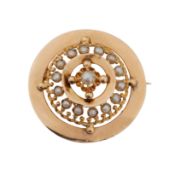 A split pearl brooch Yellow metal