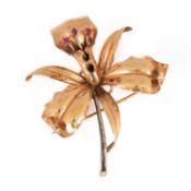 An 18ct yellow and white gold lily brooch