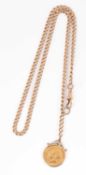 A 9ct gold watch chain hung with a George V gold half-sovereign, 1913