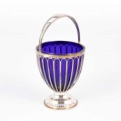 An Edwardian silver sugar basket