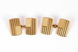 A pair of 18ct yellow gold rounded rectangular cufflinks