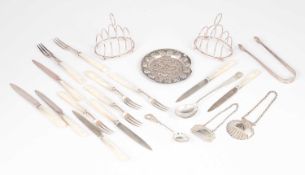 A pair of silver toast racks