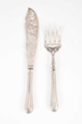 A pair of Victorian silver fish servers