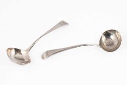 A pair of George III silver sauce ladles