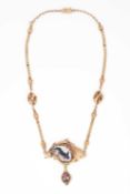 A late 19th Century yellow metal ruby and enamel necklace