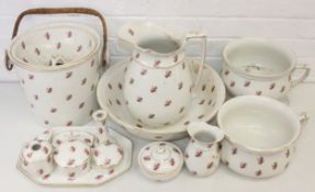 Complete antique ladies matching bedroom set with rose detail to include wash basin and jug, waste