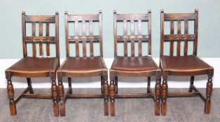 A set of four oak slat back chairs with leather or leatherette seats, 17th century style, 85cm