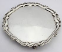 [640g] - a Georgian style silver salver or serving tray with shaped edge and shell motifs, with