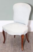 An antique upholstered bedroom chair with exposed wooden legs and light grey upholstery, 59cm x 43cm