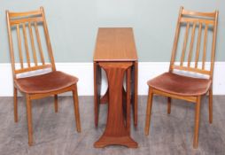 A retro mid century teak drop leaf dining table and two retro dining chairs, the table 91cm x