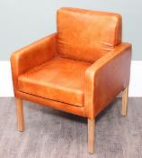 A modern light brown leather or faux leather tub chair with studded details, 67cm x 68cm x 85cm