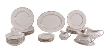 A Royal Doulton Fairfax pattern part dinner service to include dinner plates, pudding plates, side