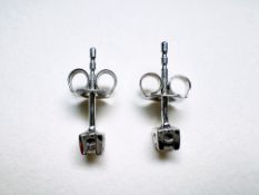 Ohrstecker 9 kt (375er) Weissgold mit 0,1 kt Diamanten