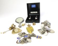 A pair of unmarked yellow metal earrings in a swir