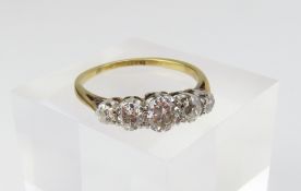 A diamond five stone ring, the graduated old cut s