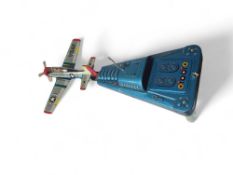 A Bandai, battery-powered, tin and miniature “U.S
