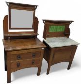 An Arts and Crafts oak washstand and an oak dressing table
