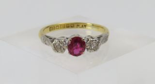 An 18ct gold and platinum ruby and diamond dress r