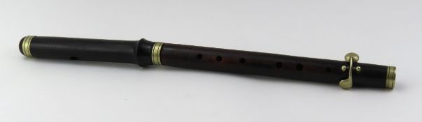A rosewood fife, two piece with brass p