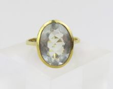 A 14ct gold aquamarine dress ring, the oval facete