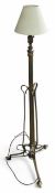 A slim brass electric lamp