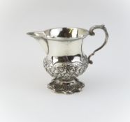 A Georgian silver milk jug