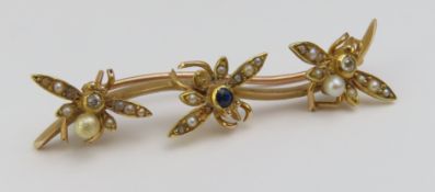 An unmarked yellow metal, pearl, diamond and sapph