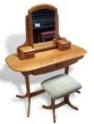 A mid-20th century wooden dressing table
