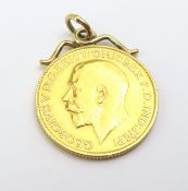 A 1911, George IV mounted full sovereign with Geor