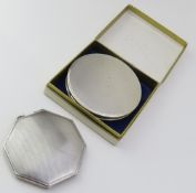Two silver powder compacts with mirrors