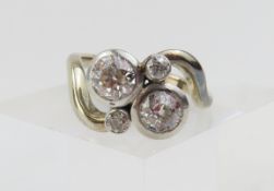 An unusual white gold old cut diamond ring, the tw