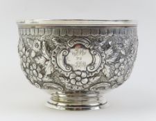 An Irish silver bowl with embossed decoration
